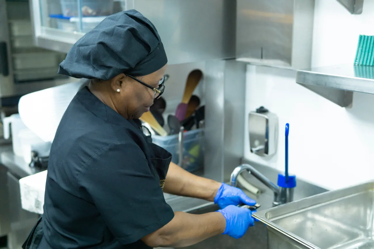 A cook working in hospital kitchen